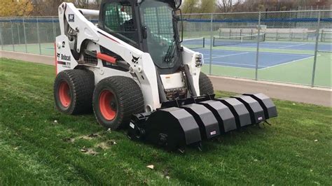 aerator skid steer|bobcat skid steer attachments.